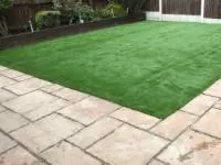 Completed artificial lawn installation by Decorative Stone Driveways