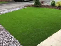 Completed artificial lawn installation by Decorative Stone Driveways
