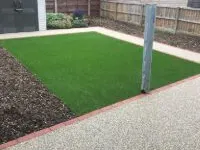 Completed artificial lawn installation by Decorative Stone Driveways