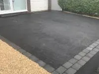 Completed tarmac installation by Decorative Stone Driveways